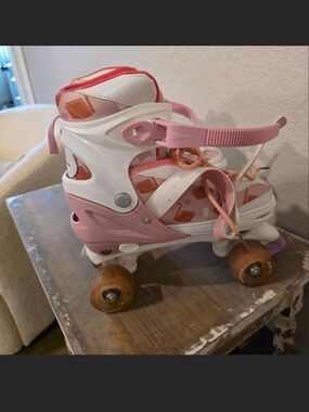 Kids Pink and White Adjustable Quad Roller Skates